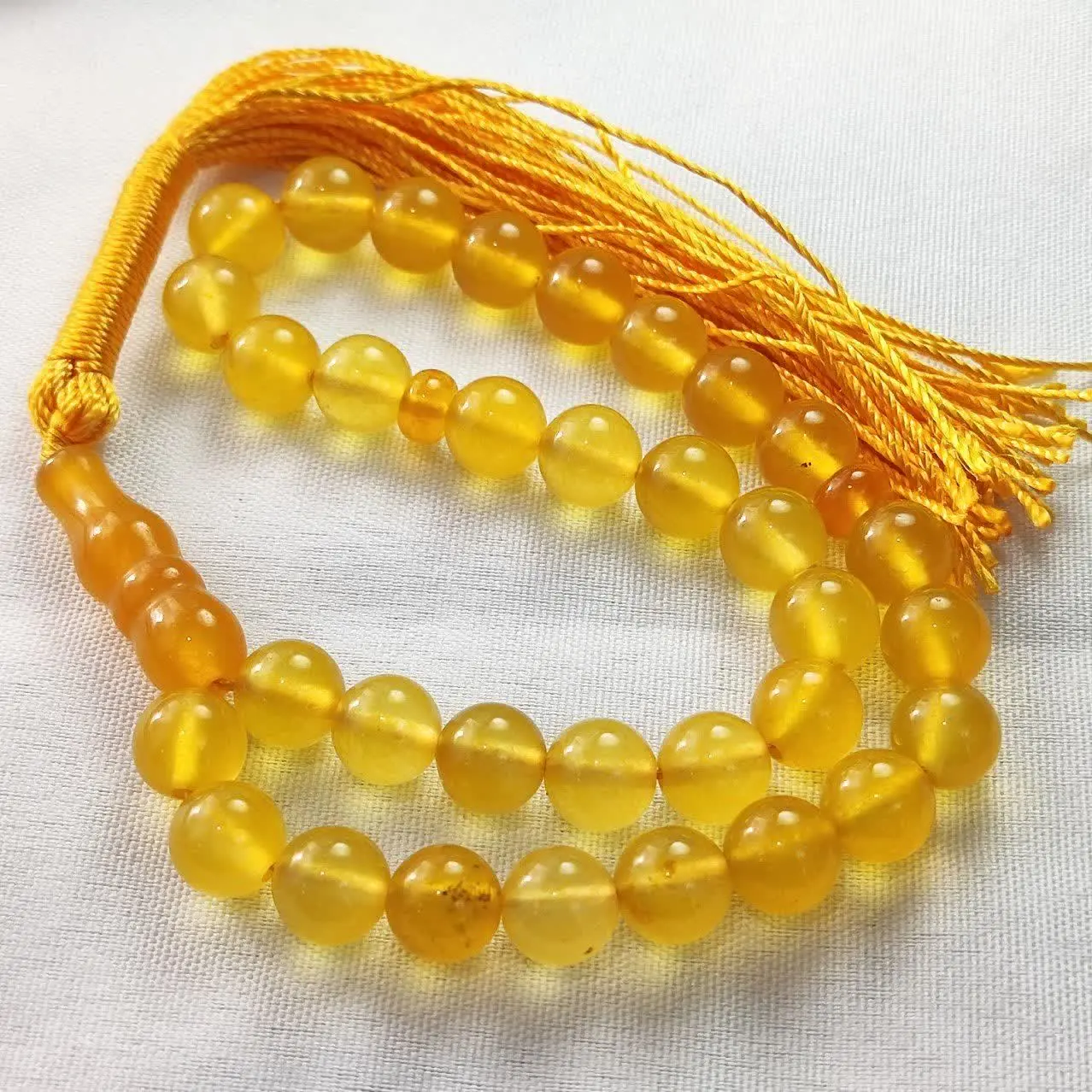 +تسبیح ۳۳ تایی عقیق زرد
